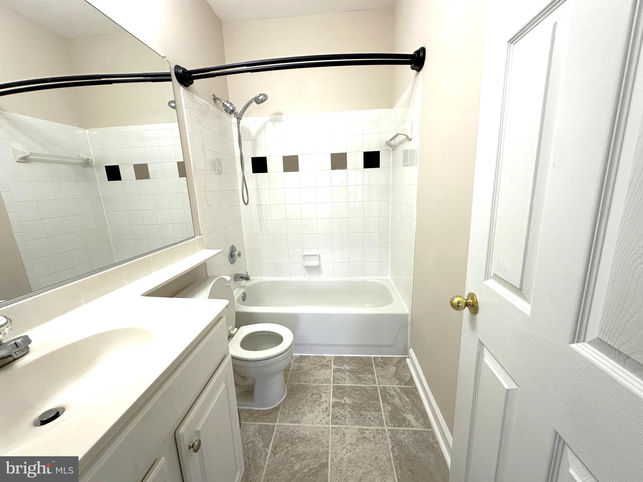 21798 Jarvis Square Ashburn, VA 20147 - Photo 24 of 29 a bathroom with a sink a toilet and a bathtub