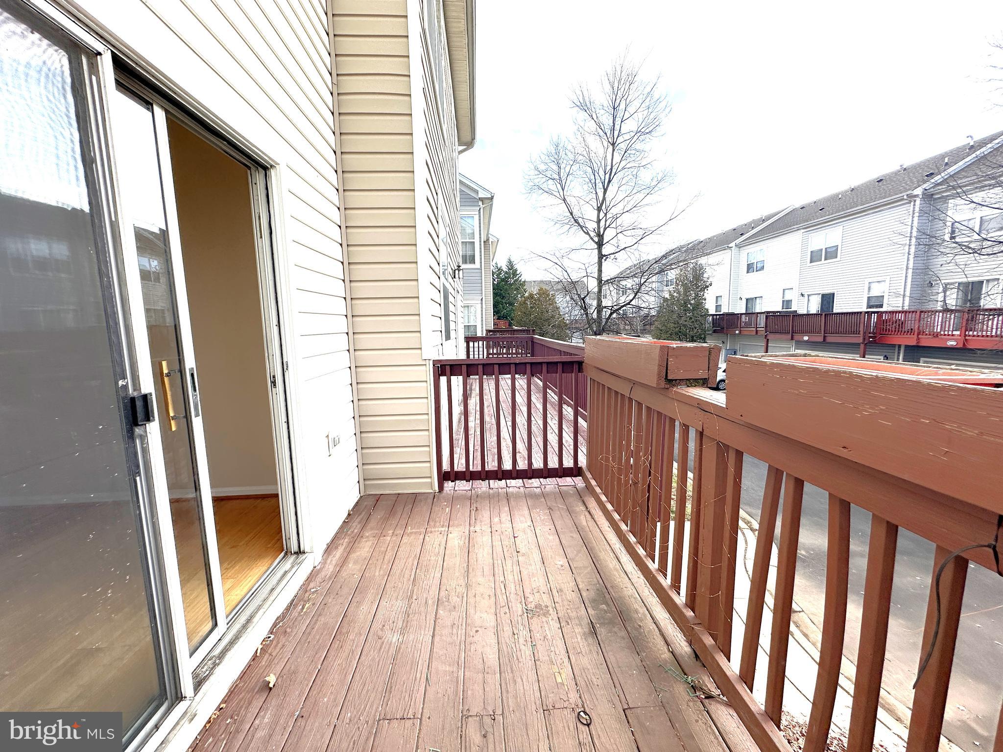 21798 Jarvis Square Ashburn, VA 20147 - Photo 25 of 29 a view of a balcony with wooden floor