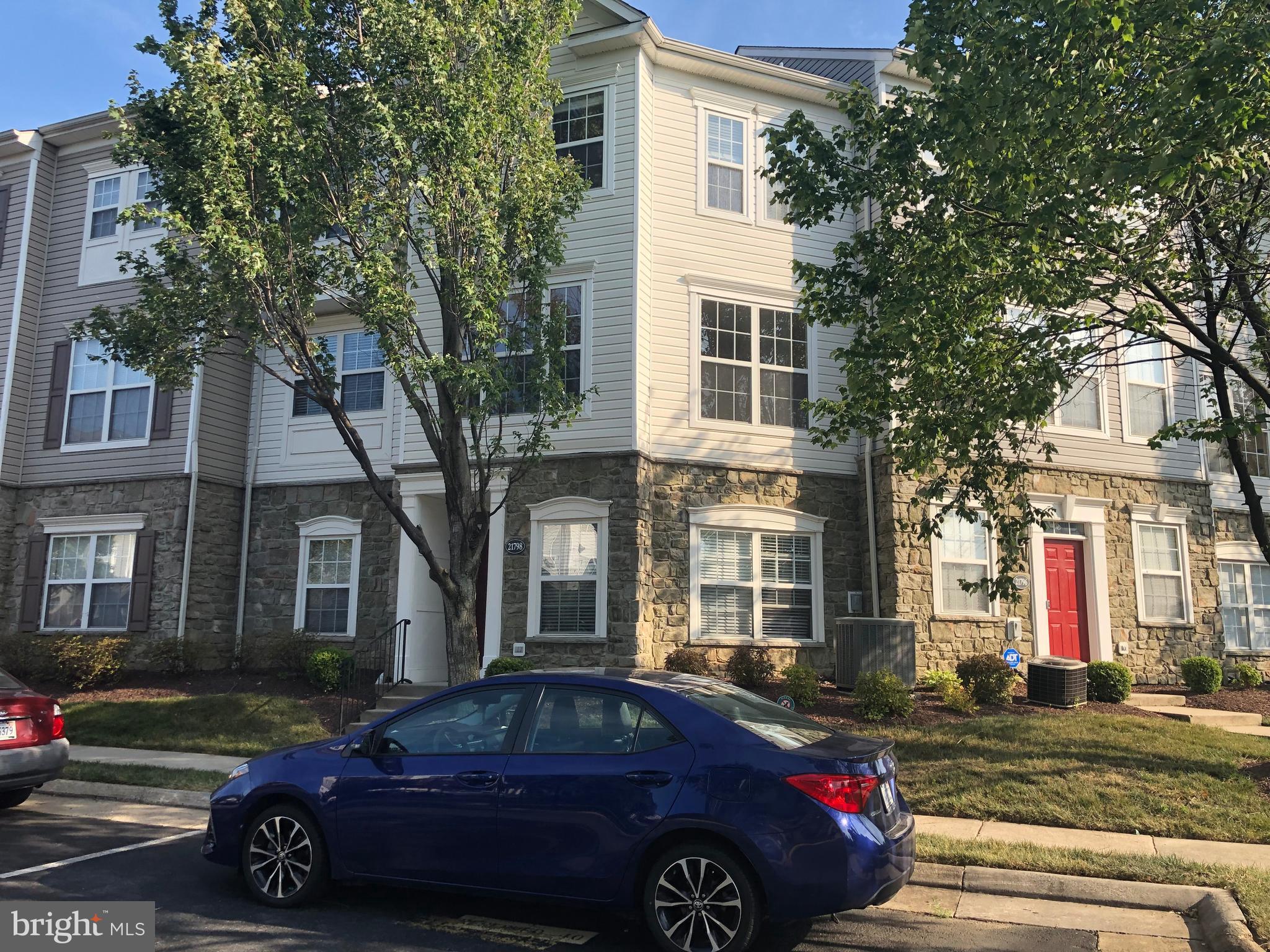 21798 Jarvis Square Ashburn, VA 20147 - Photo 27 of 29 a car parked in front of a house