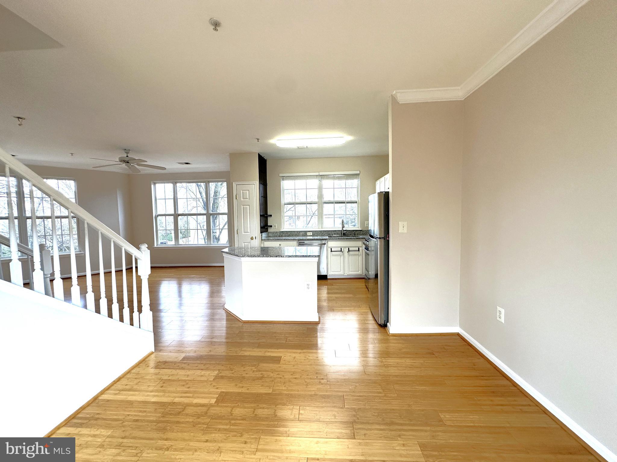 21798 Jarvis Square Ashburn, VA 20147 - Photo 7 of 29 a view of kitchen and hall with wooden floor