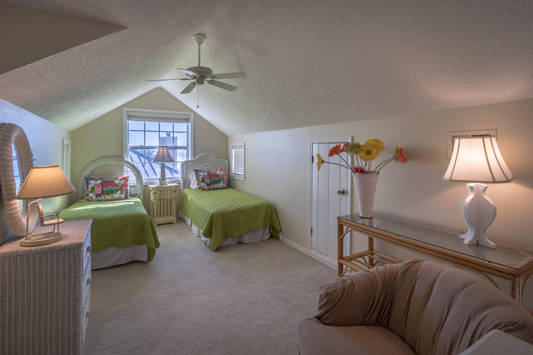 701 Eastern Lake Road Santa Rosa Beach, FL 32459 - Photo 35 of 45 a bedroom with a bed and a chandelier