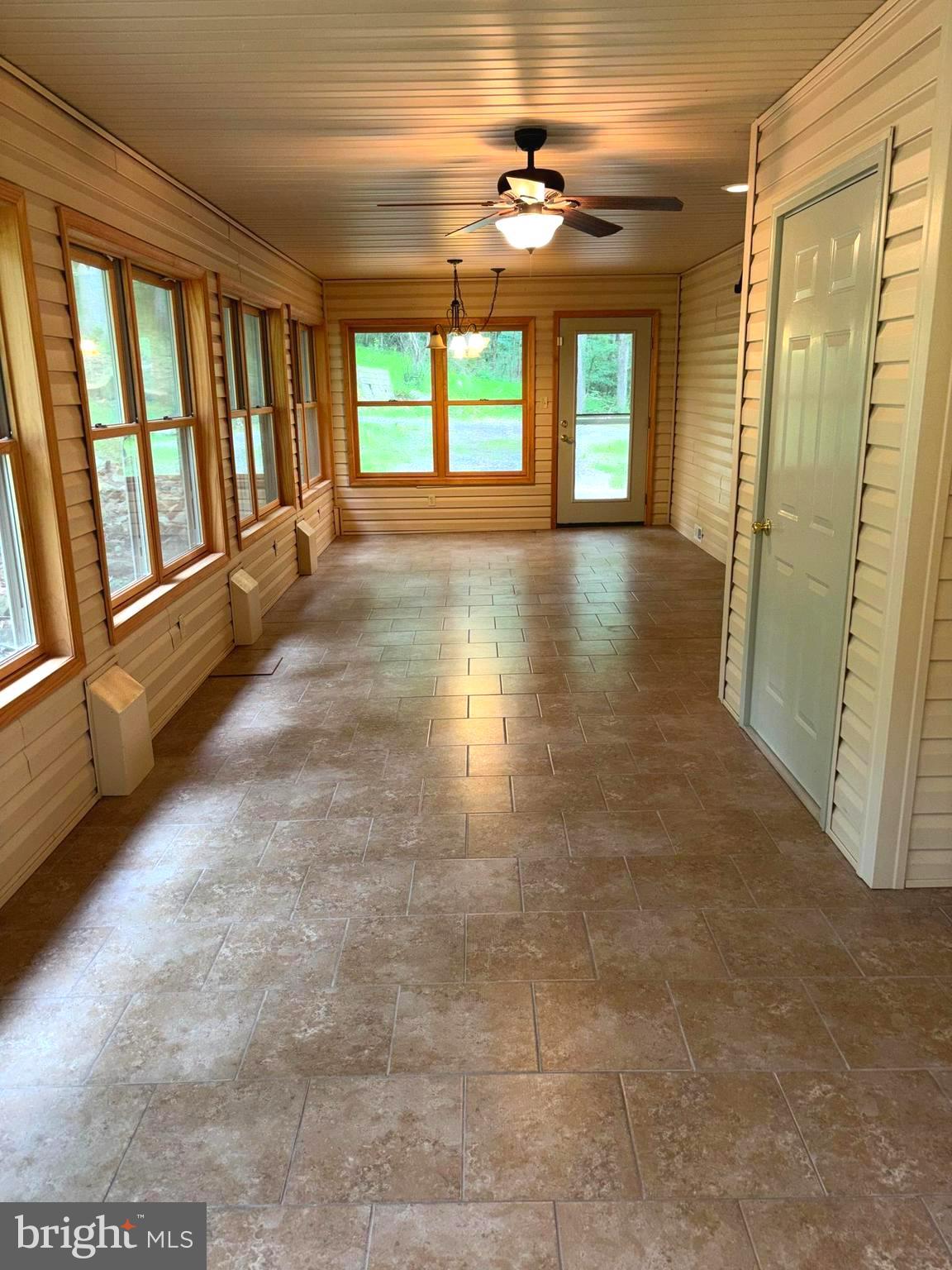 251 Riffey Mountain Lane Mathias, WV 26812 - Photo 25 of 33 Large 4 season sun room 35 x 13