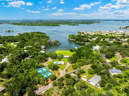 a view of a lake with a yard