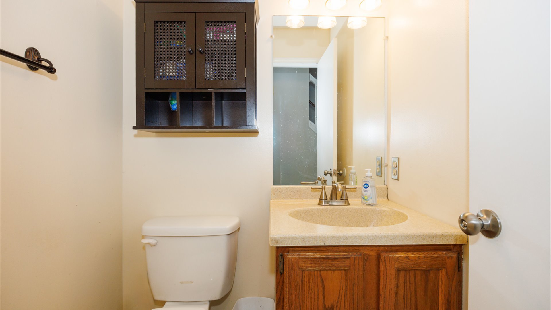 2007 Fallen Oak Road Bloomington, IL 61704 - Photo 17 of 44 a bathroom with a toilet a sink and mirror