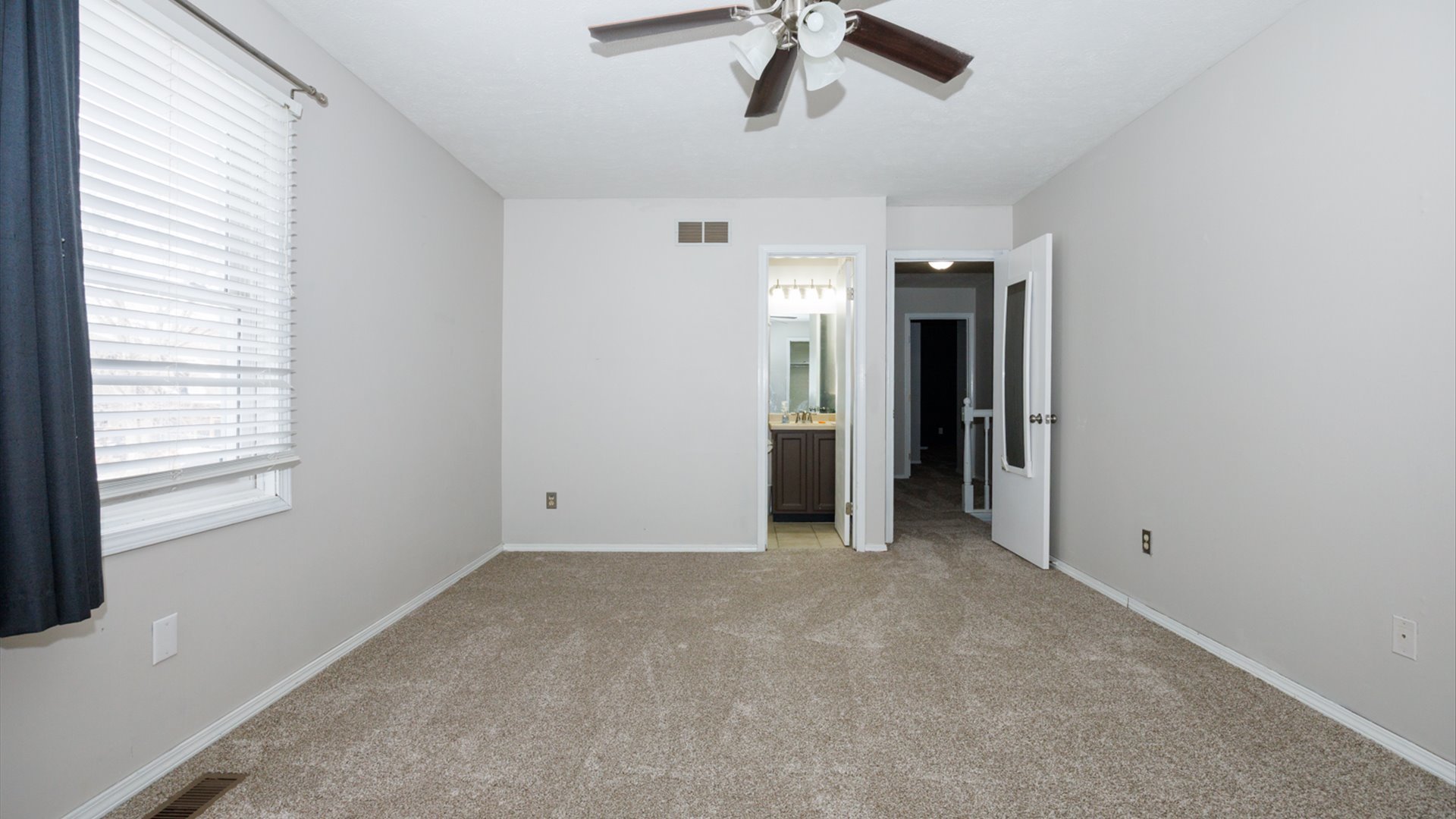 2007 Fallen Oak Road Bloomington, IL 61704 - Photo 20 of 44 a view of an empty room with a window