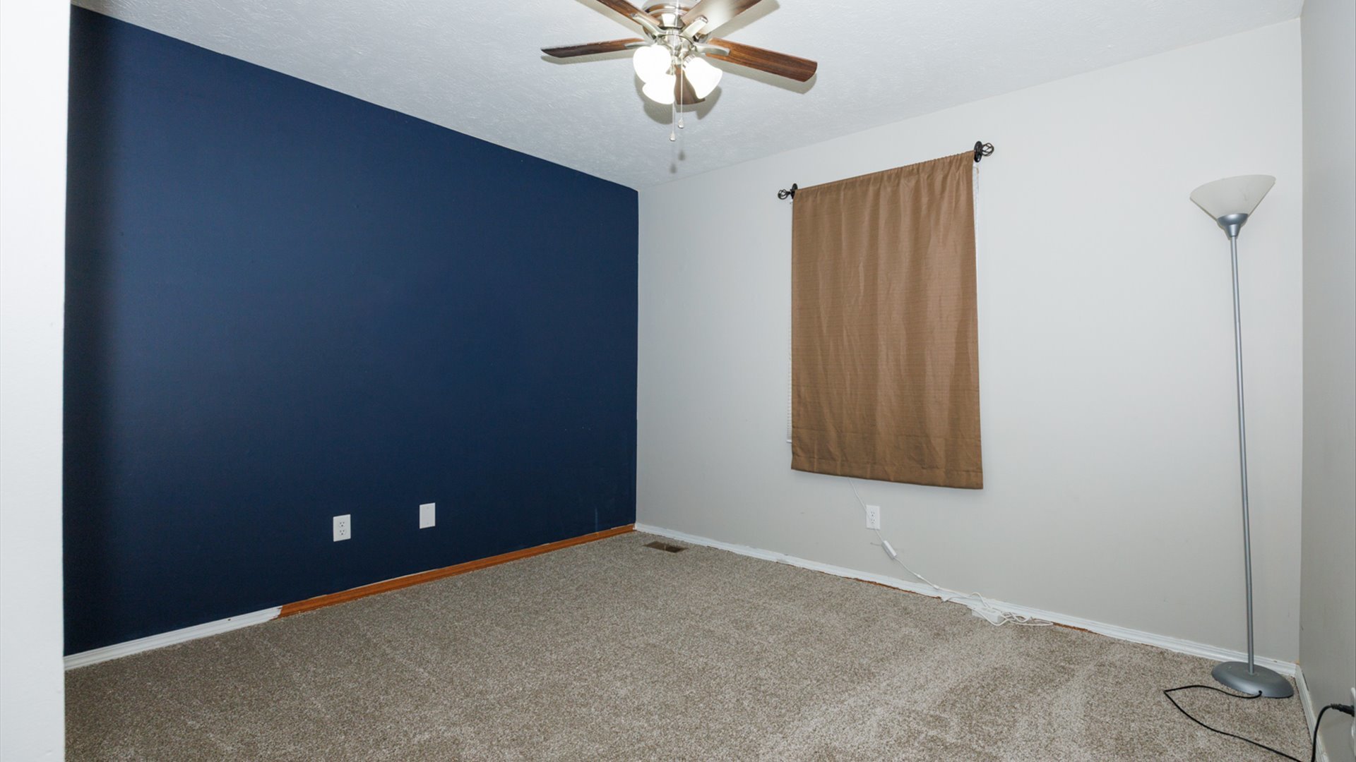 2007 Fallen Oak Road Bloomington, IL 61704 - Photo 24 of 44 an empty room with windows and fan