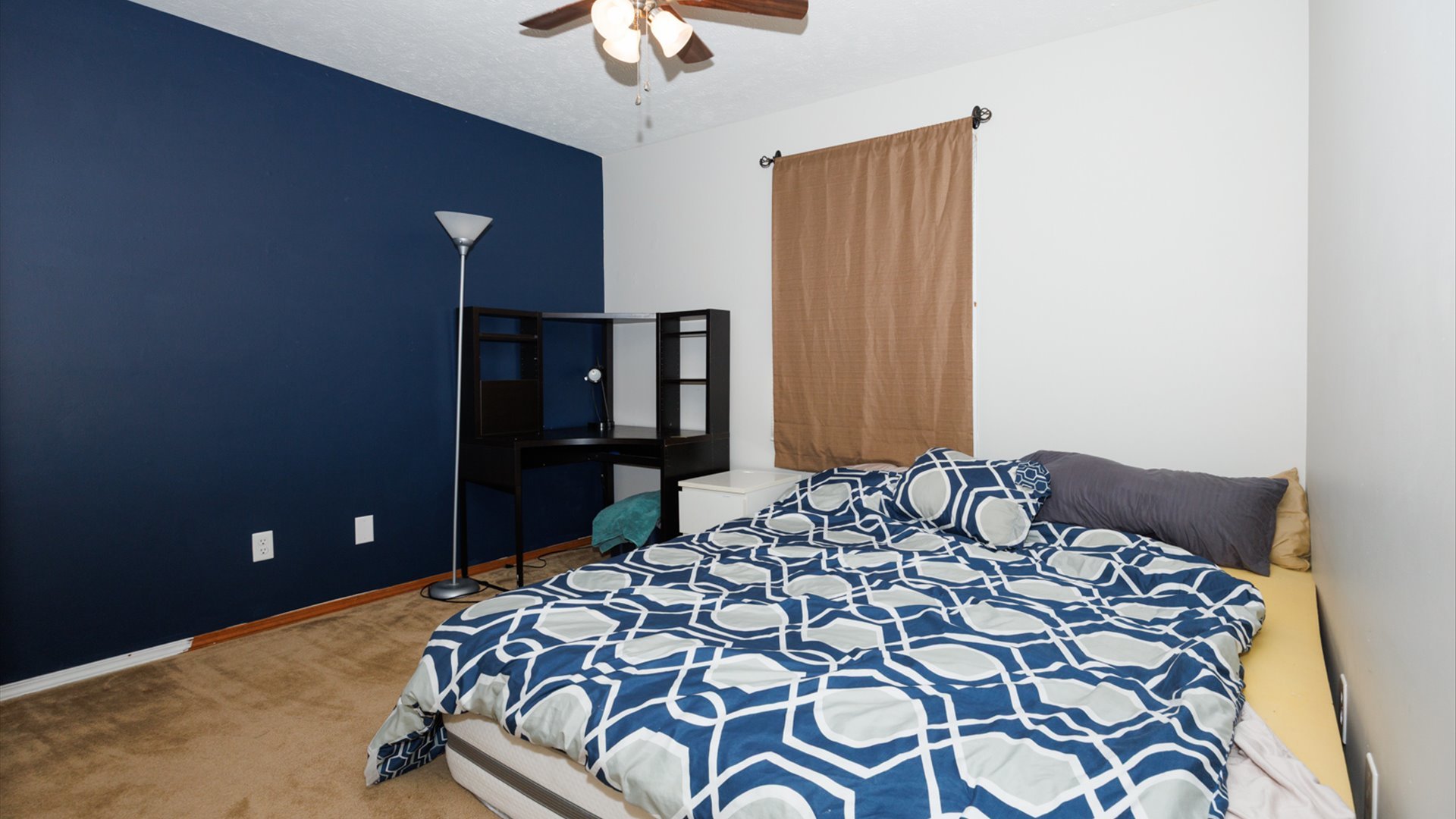2007 Fallen Oak Road Bloomington, IL 61704 - Photo 25 of 50 a bedroom with a bed and a chandelier