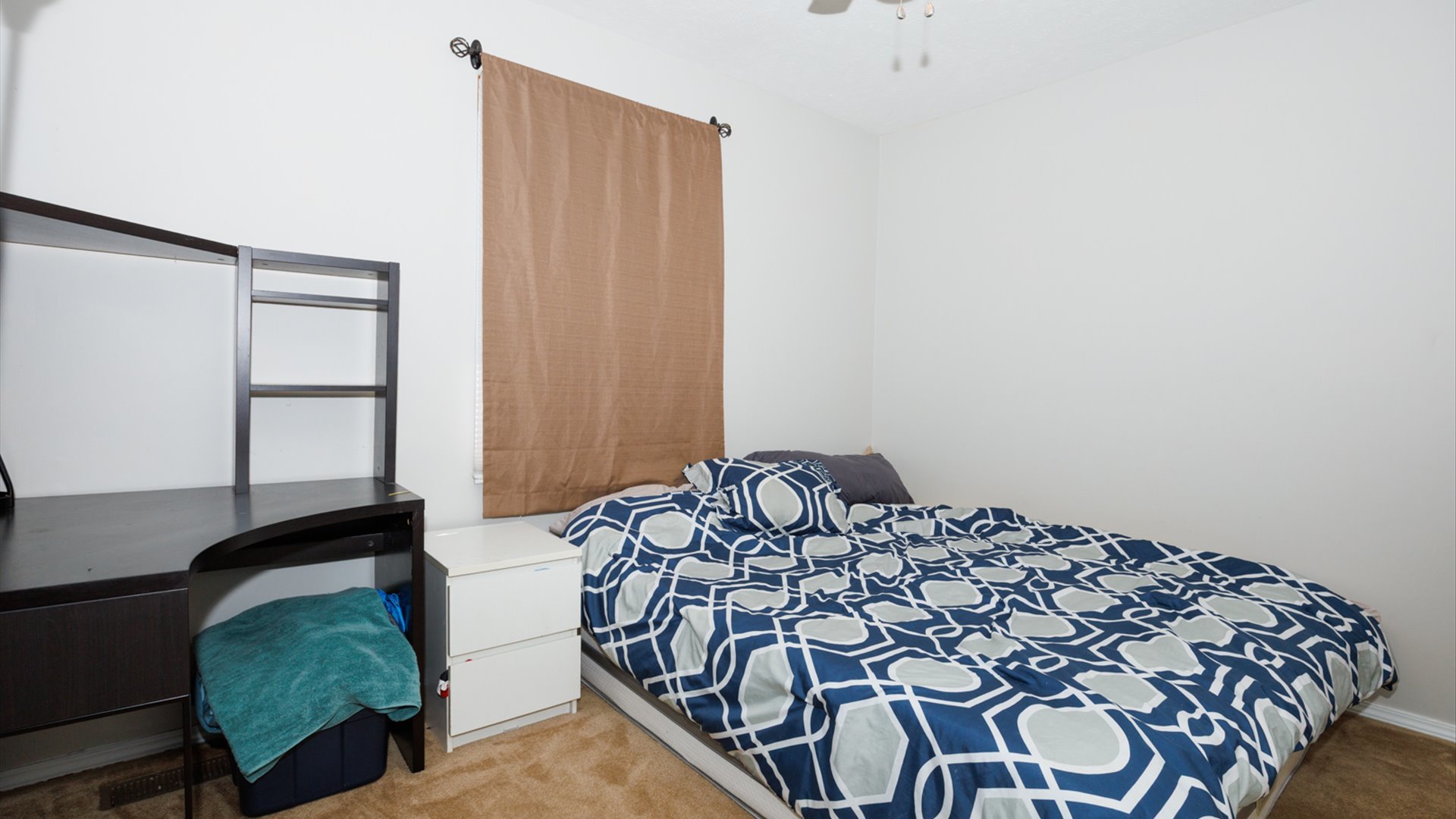 2007 Fallen Oak Road Bloomington, IL 61704 - Photo 26 of 50 a bedroom with a bed and chair