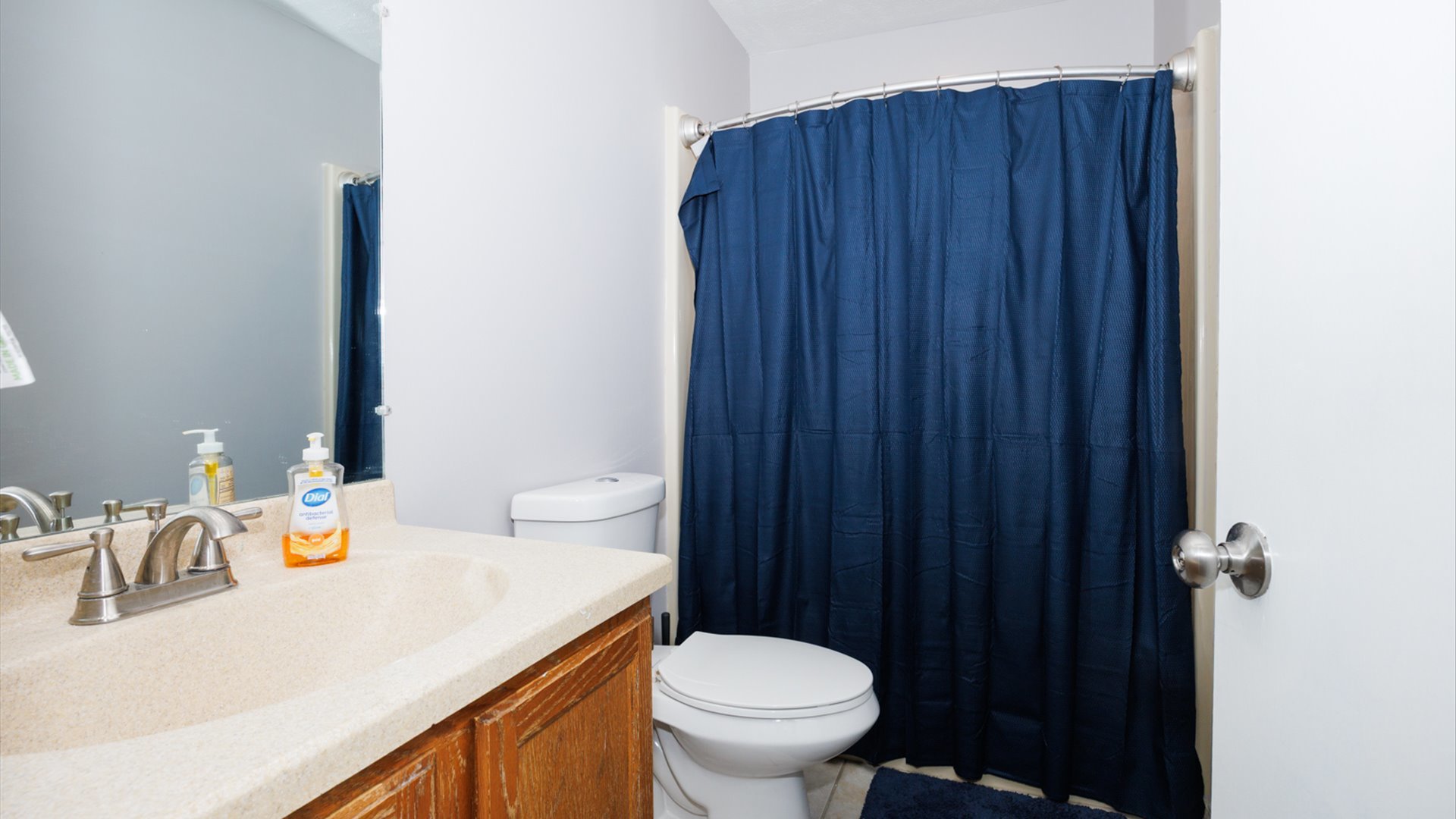 2007 Fallen Oak Road Bloomington, IL 61704 - Photo 31 of 50 a bathroom with a sink a toilet and shower