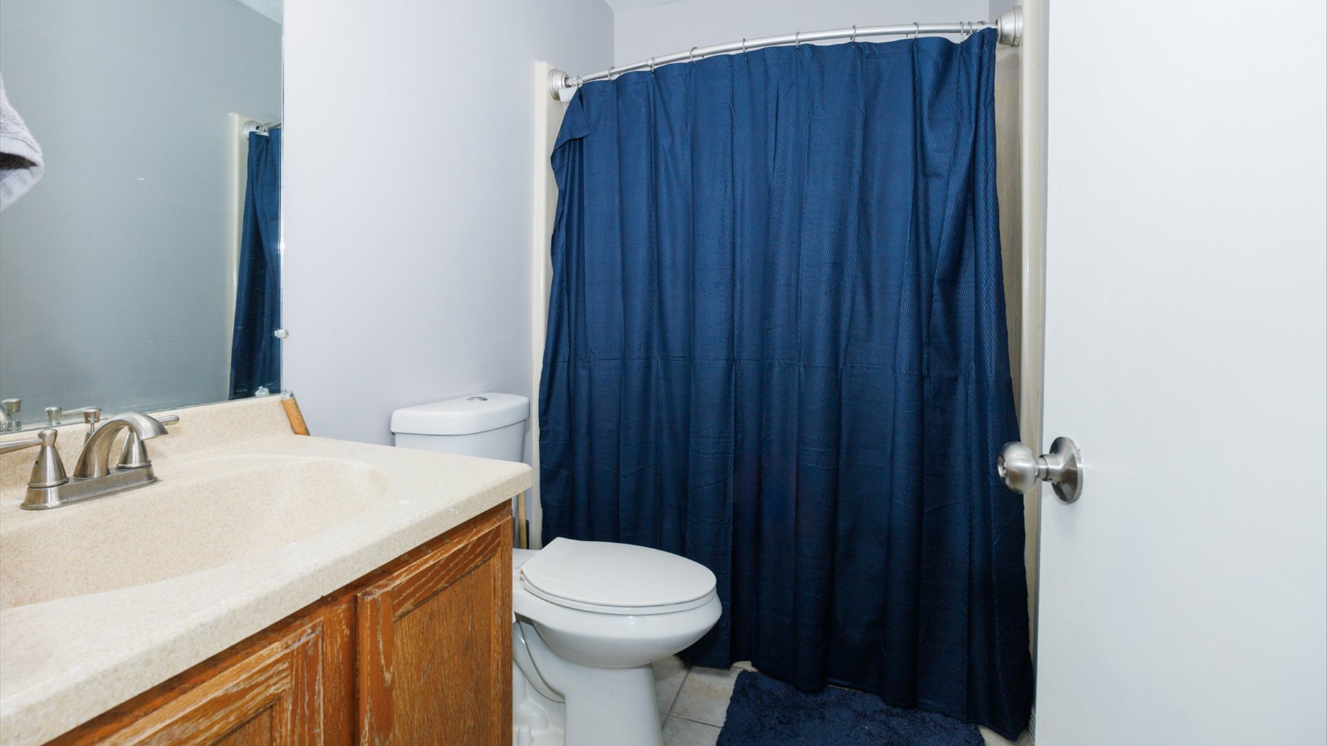 2007 Fallen Oak Road Bloomington, IL 61704 - Photo 31 of 44 a bathroom with a sink a toilet and shower