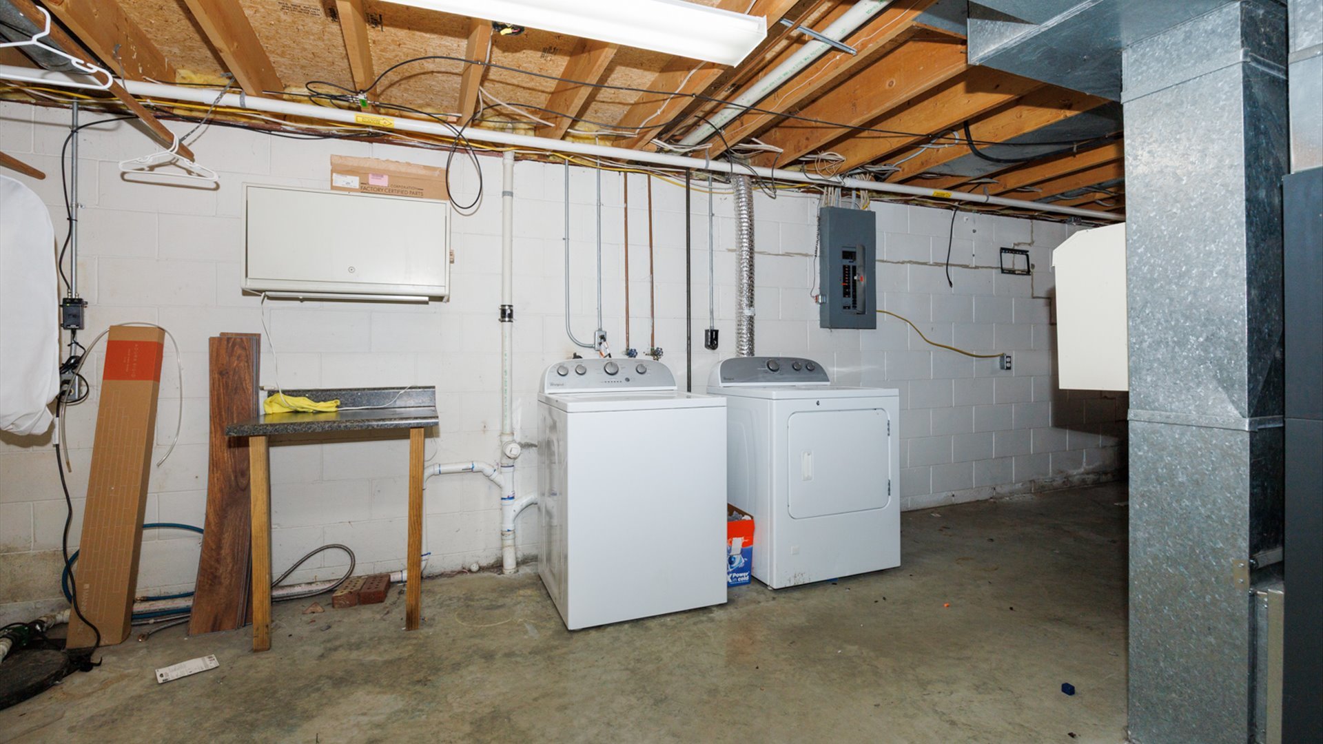 2007 Fallen Oak Road Bloomington, IL 61704 - Photo 34 of 44 a utility room with cabinets and a wooden floors