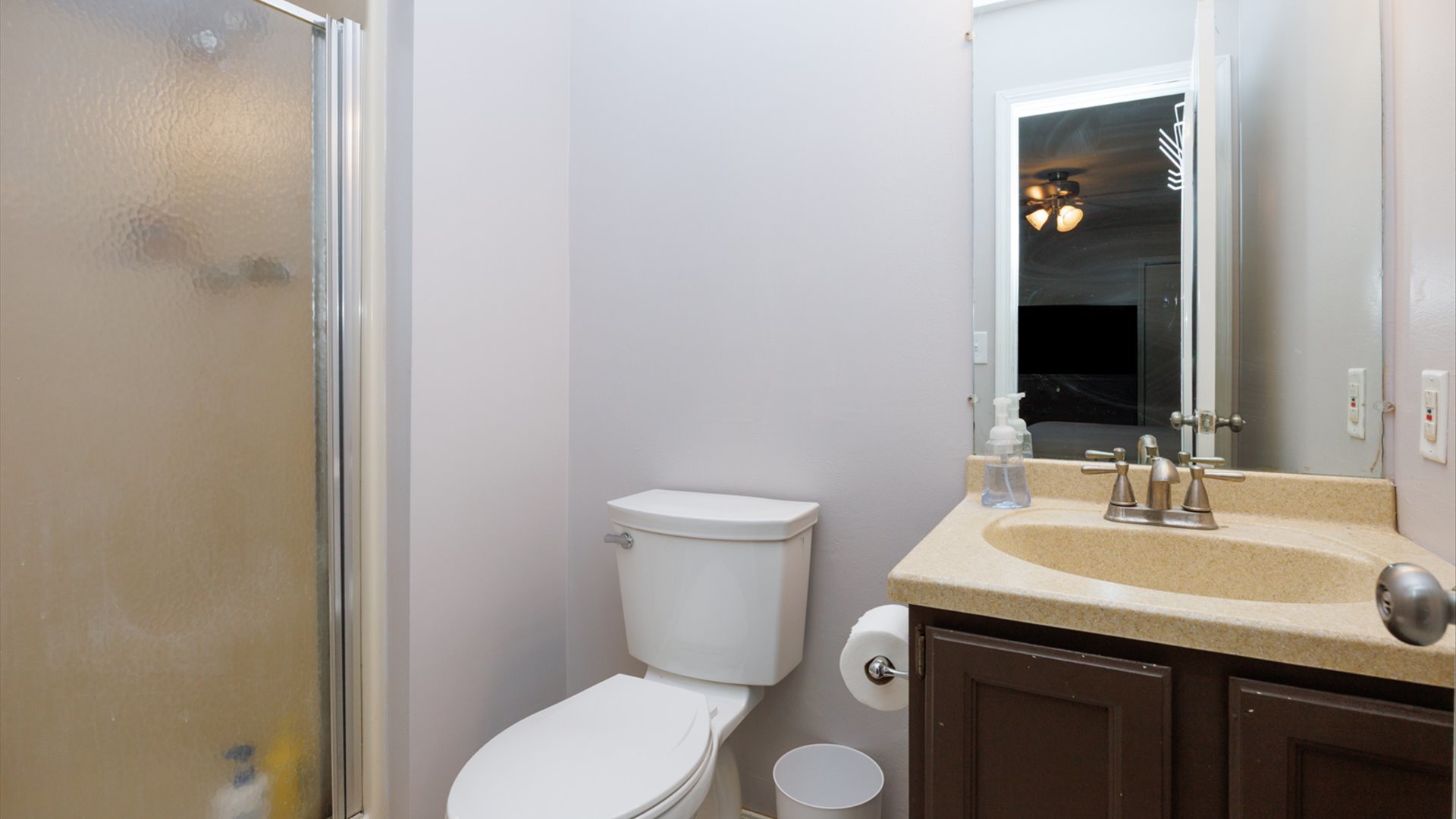 2007 Fallen Oak Road Bloomington, IL 61704 - Photo 35 of 50 a bathroom with a sink a toilet and mirror