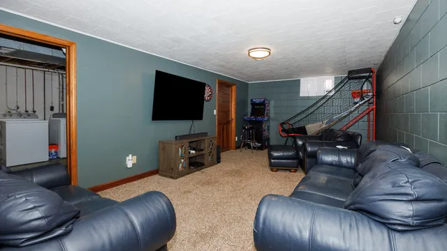 a living room with a couch and a flat screen tv