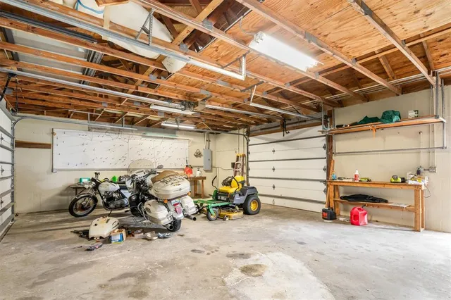 a view of a garage with a table and chairs