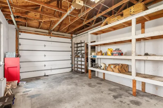 a view of an empty room with racks on the wall