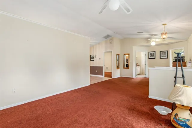 a view of a livingroom with furniture and wooden floor