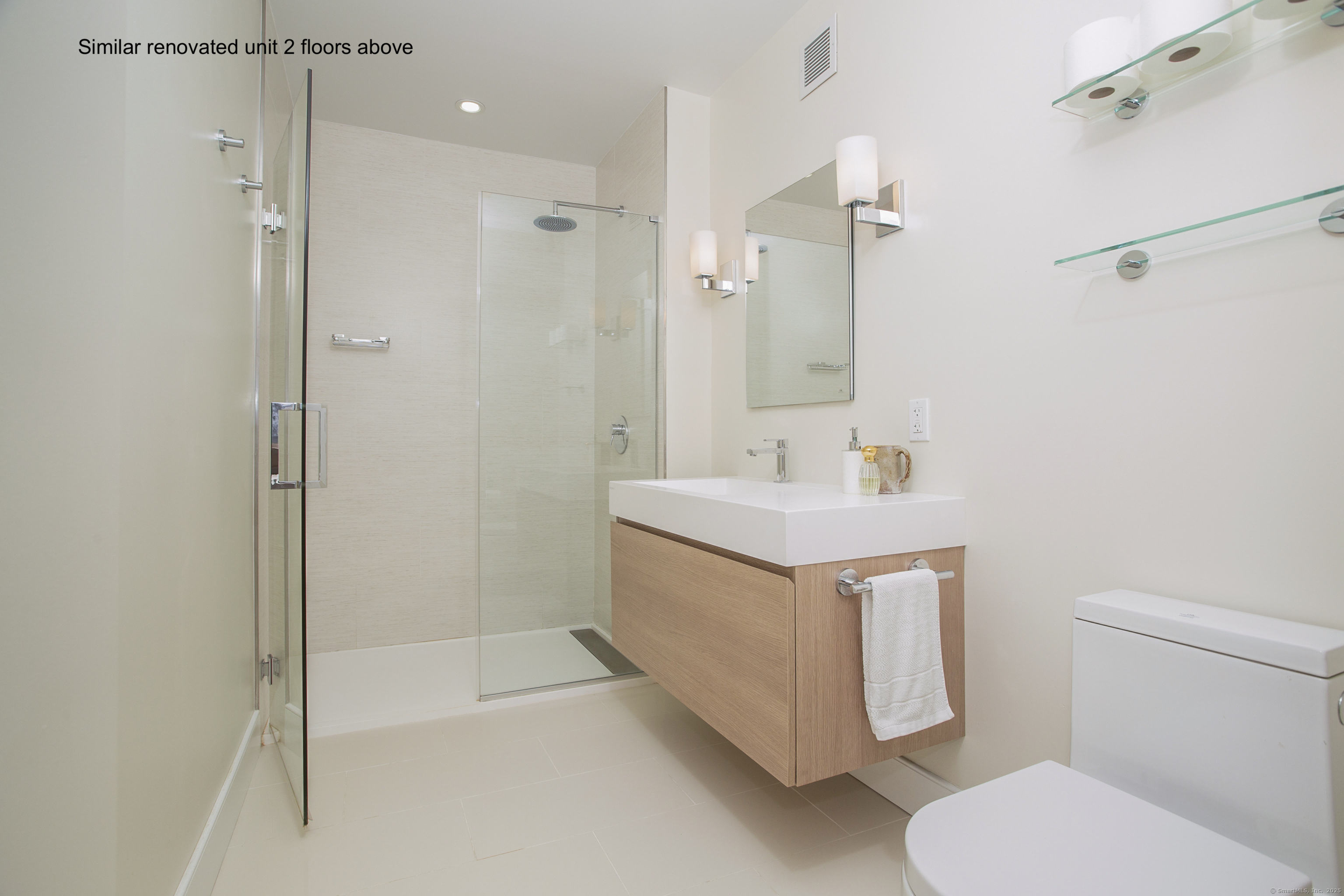 4 Putnam Hill, Unit 1C Greenwich, CT 06830 - Photo 15 of 29 a bathroom with a sink a toilet and shower