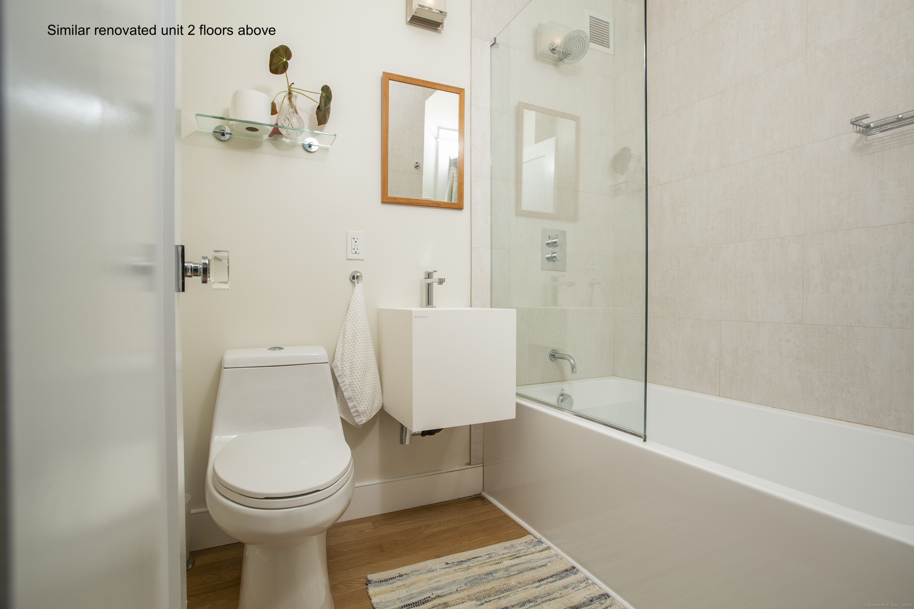 4 Putnam Hill, Unit 1C Greenwich, CT 06830 - Photo 19 of 29 a bathroom with a toilet and a shower