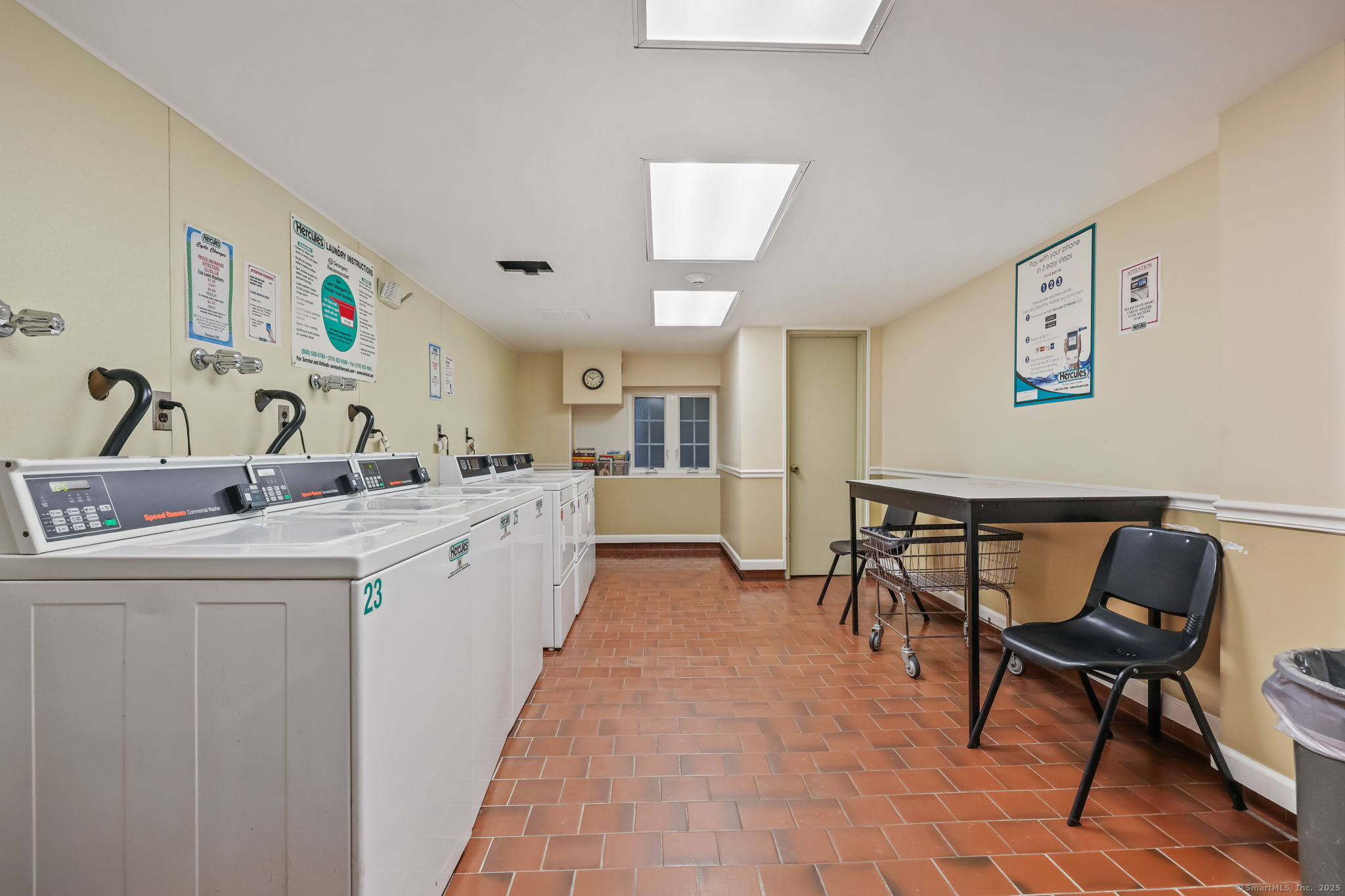 4 Putnam Hill, Unit 1C Greenwich, CT 06830 - Photo 27 of 29 a living room with a sink and furniture