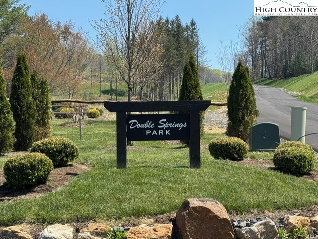 Mount Mitchell Drive Newland, NC 28657 - Photo 6 of 10 a view of backyard with table and chairs and a fire pit