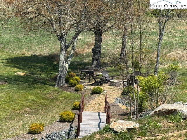 Mount Mitchell Drive Newland, NC 28657 - Photo 9 of 10 a view of a yard with an outdoor seating