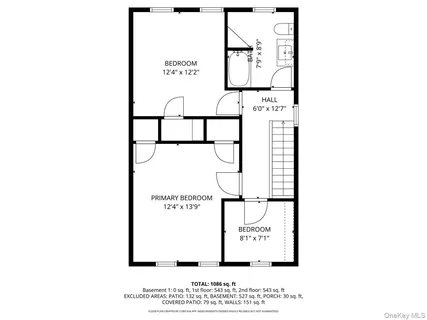 a picture of a bench in front of a wall