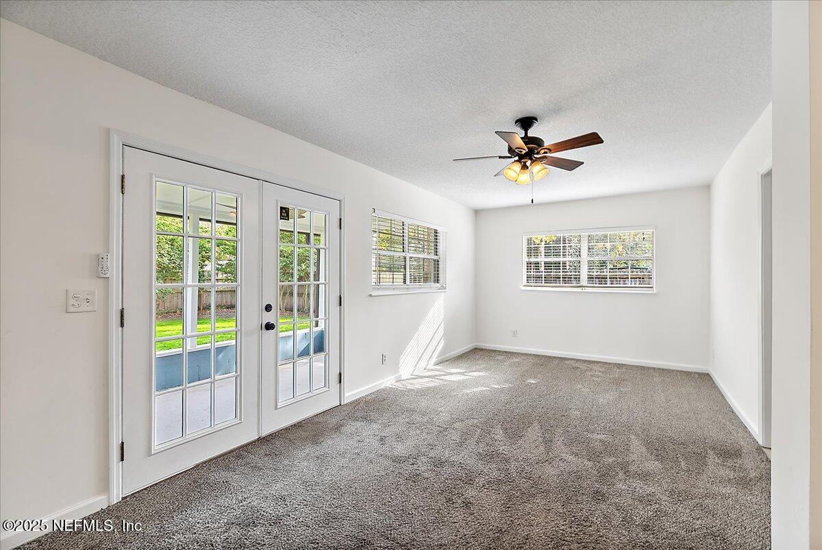 1879 George Street Atlantic Beach, FL 32233 - Photo 17 of 27 a view of an empty room with a window