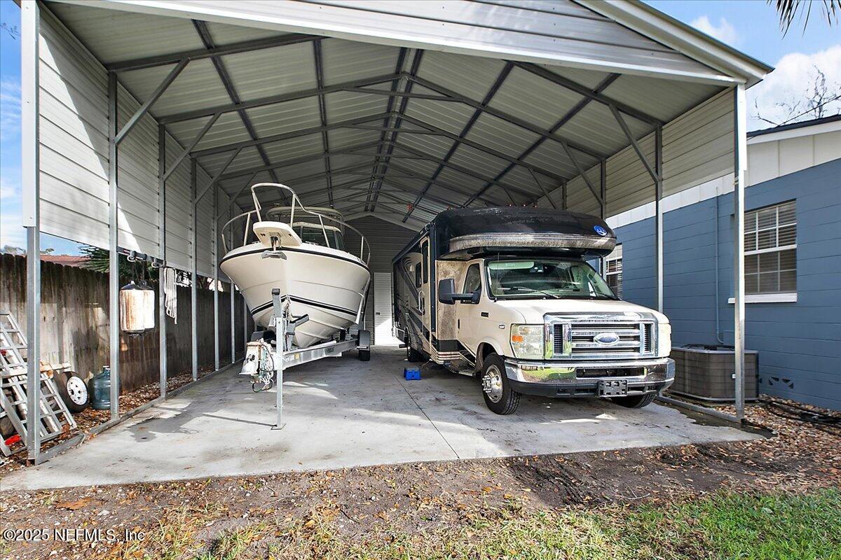 1879 George Street Atlantic Beach, FL 32233 - Photo 23 of 27 a car parked in garage