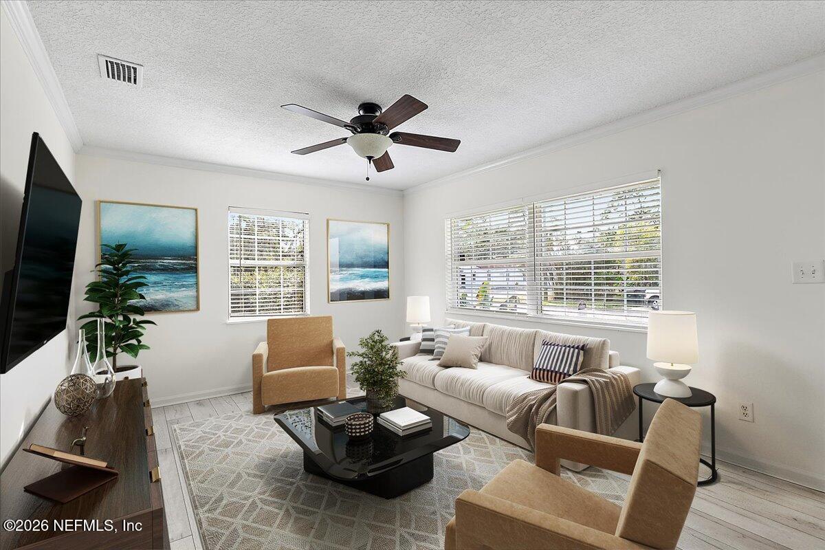 1879 George Street Atlantic Beach, FL 32233 - Photo 3 of 27 a living room with furniture and a large window