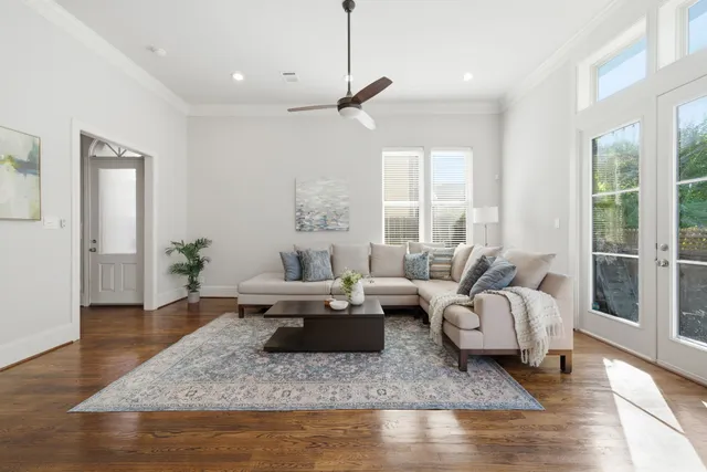 a large kitchen with lots of counter space a sink dining table and chairs