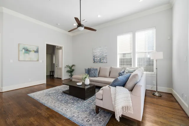 a kitchen with granite countertop a sink stove and cabinets