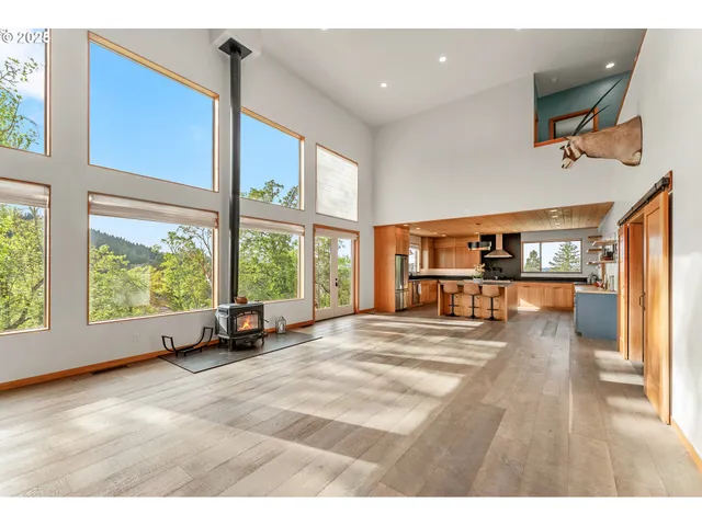 a room with window and pool table