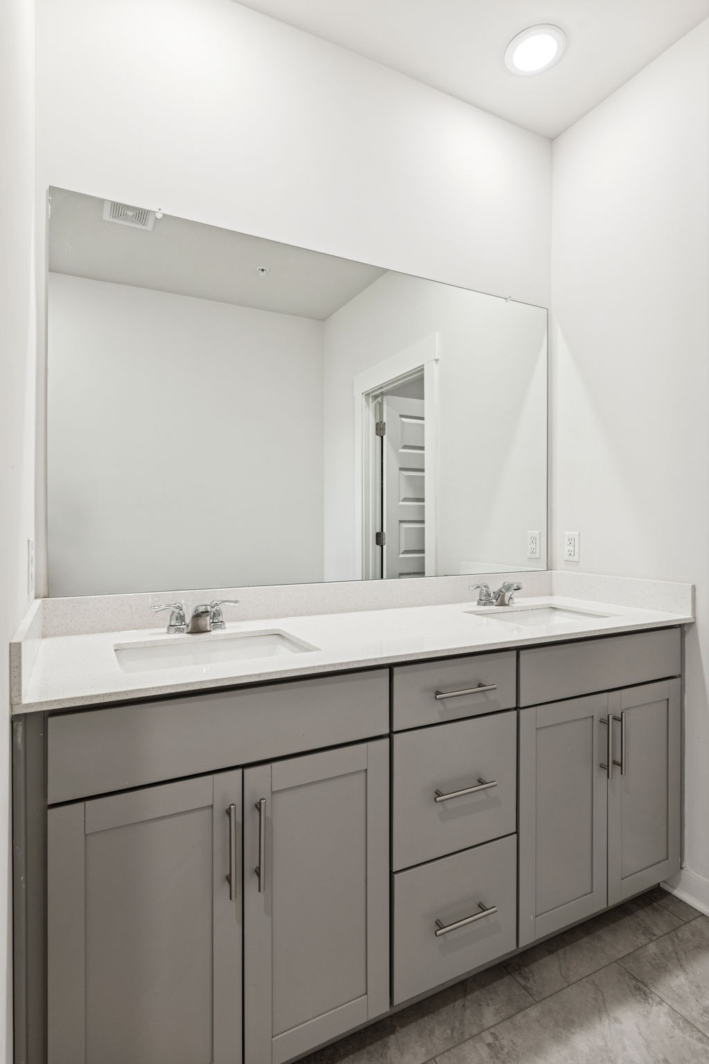 603 Birdie Dr Spring Hill Spring Hill, TN 37174 - Photo 13 of 26 a bathroom with a double vanity sink and mirror