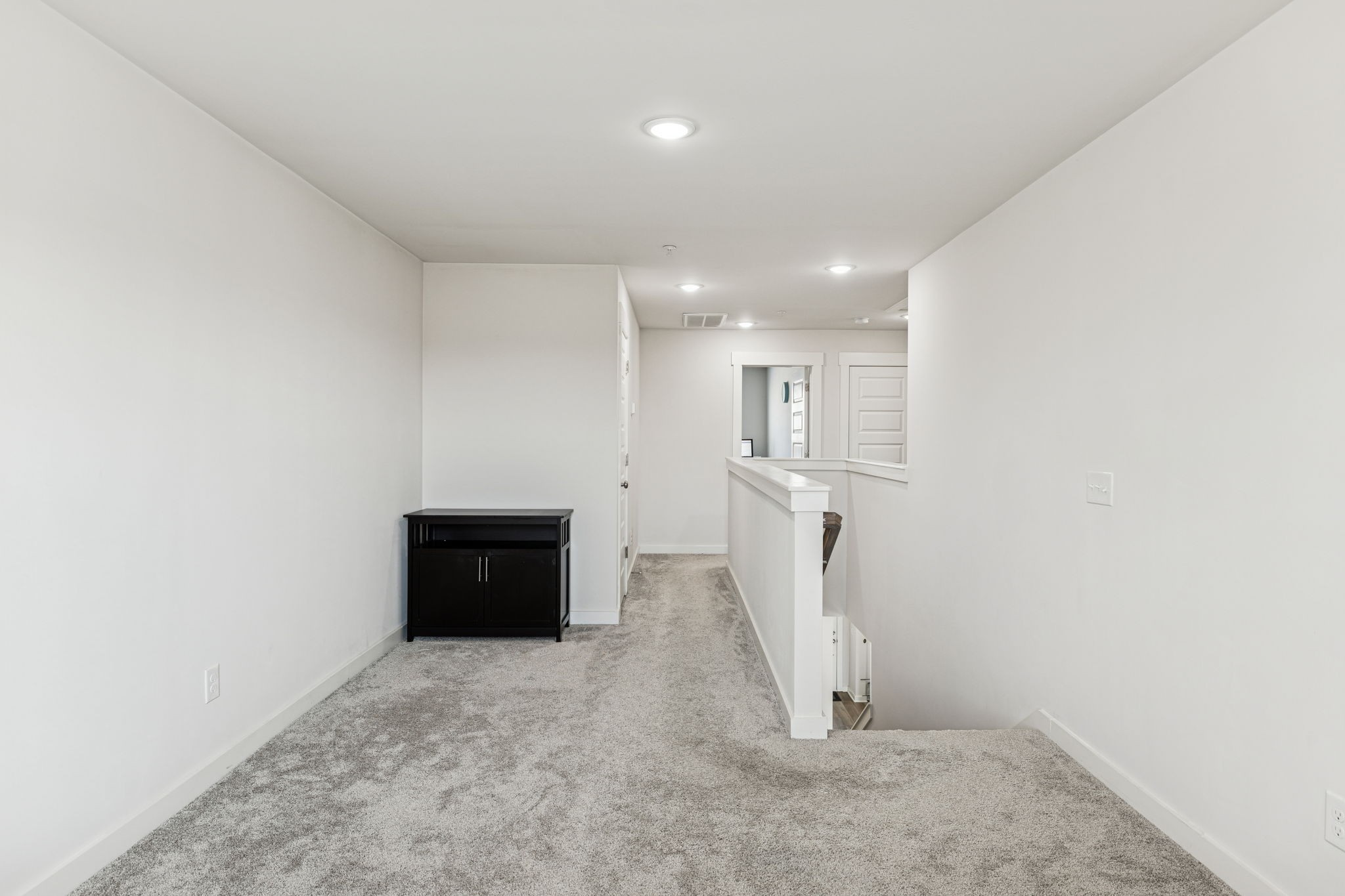 603 Birdie Dr Spring Hill Spring Hill, TN 37174 - Photo 16 of 26 an empty room with an entryway and wooden floor