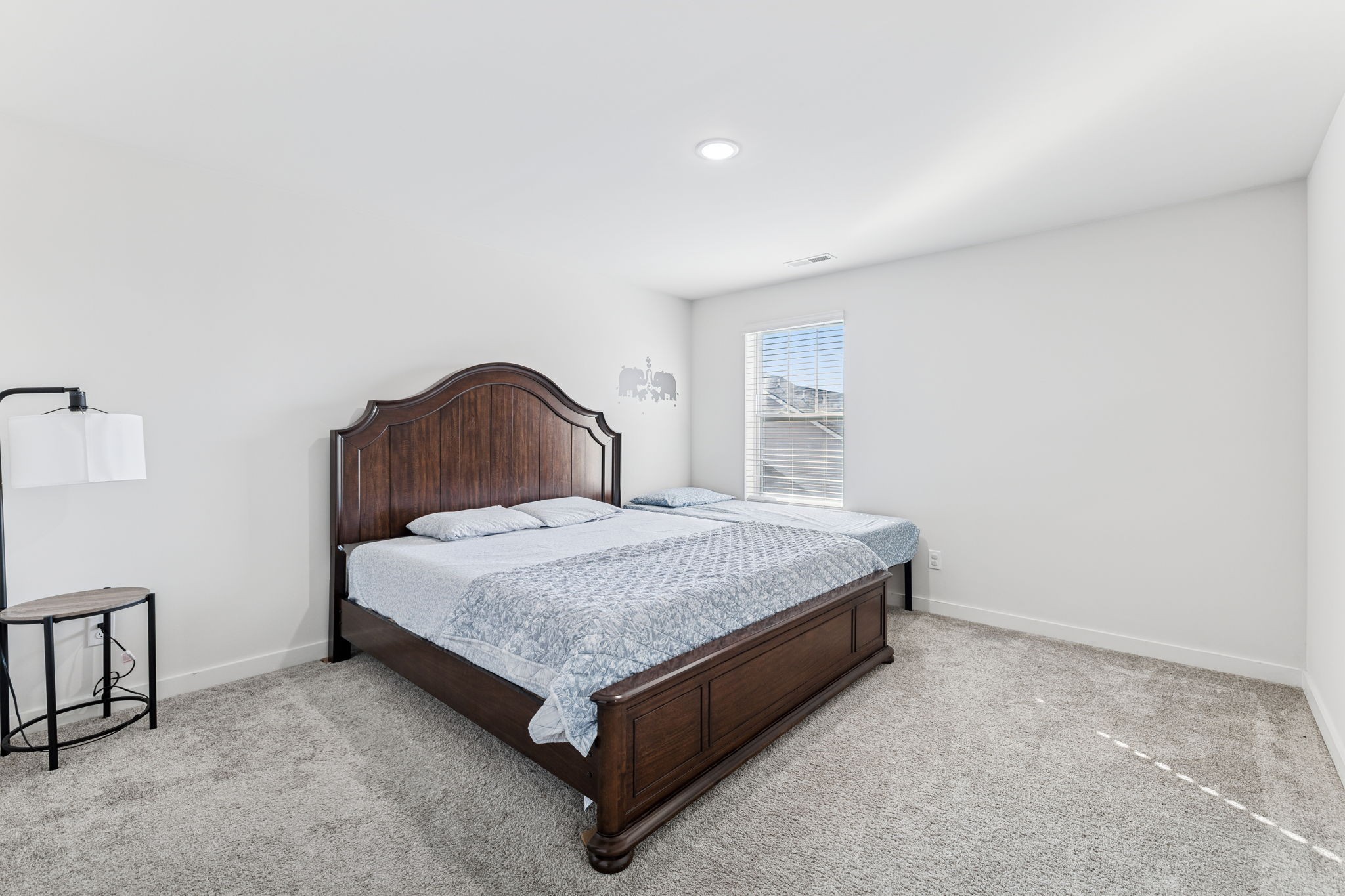603 Birdie Dr Spring Hill Spring Hill, TN 37174 - Photo 20 of 26 a bedroom with a bed and a dresser