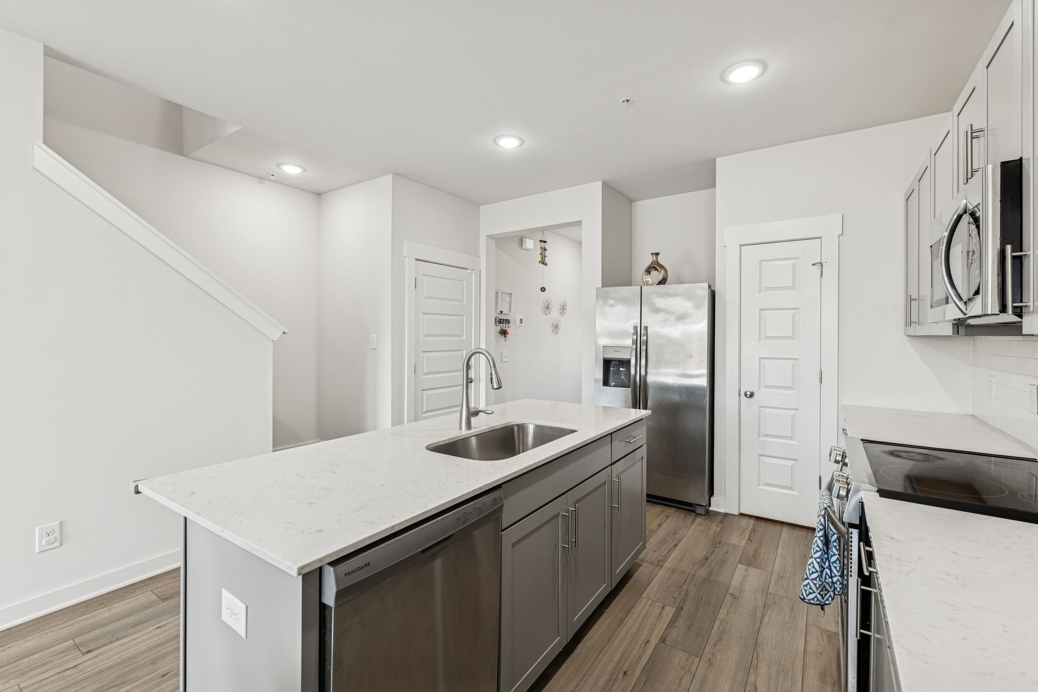 603 Birdie Dr Spring Hill Spring Hill, TN 37174 - Photo 7 of 26 a kitchen with sink cabinets and refrigerator