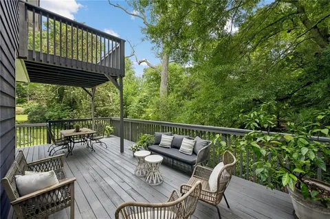a view of balcony with furniture and outdoor seating