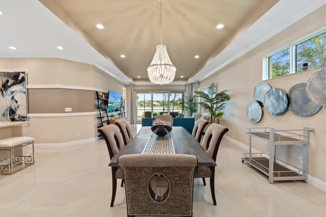 a view of a dining room with furniture window and outside view