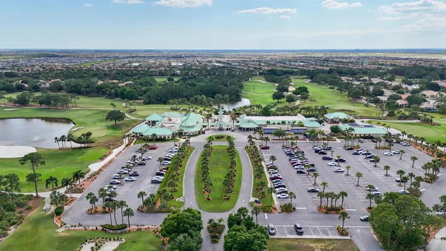 an aerial view of a city with a lake view