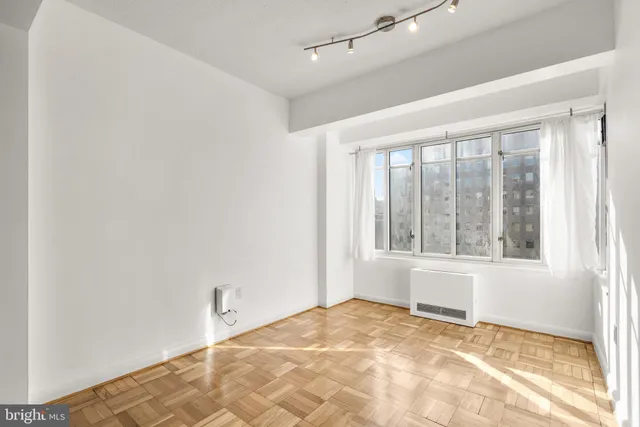 a view of an empty room and window