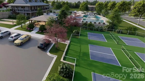 an aerial view of a house with yard pool patio and outdoor seating