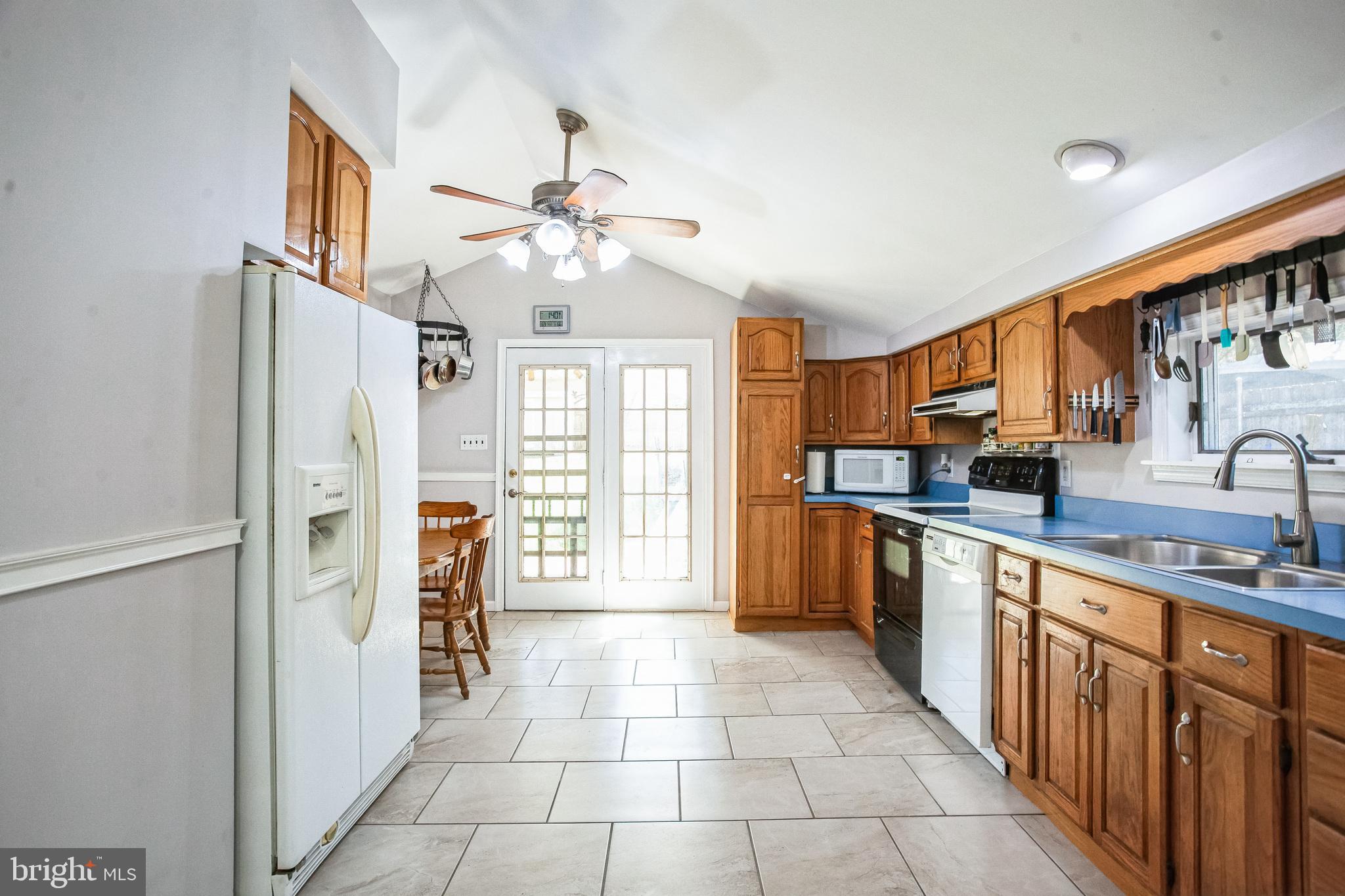 2775 Valley Road Jamison, PA 18929 - Photo 15 of 40 a large kitchen with stainless steel appliances a counter space a sink and cabinets