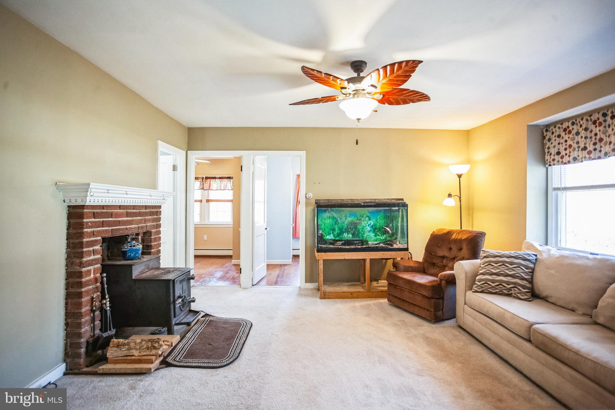 2775 Valley Road Jamison, PA 18929 - Photo 22 of 40 a living room with furniture and a fireplace