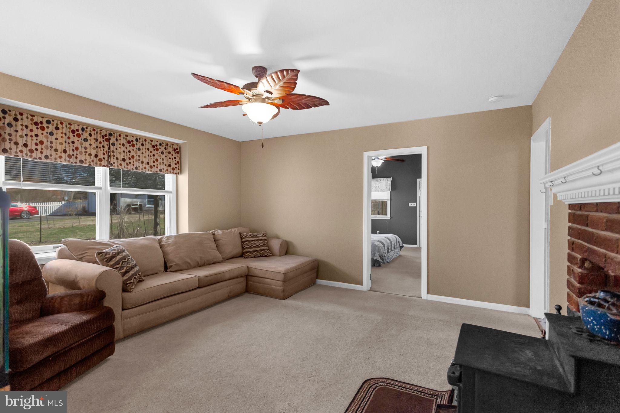 2775 Valley Road Jamison, PA 18929 - Photo 23 of 40 a living room with furniture and a flat screen tv