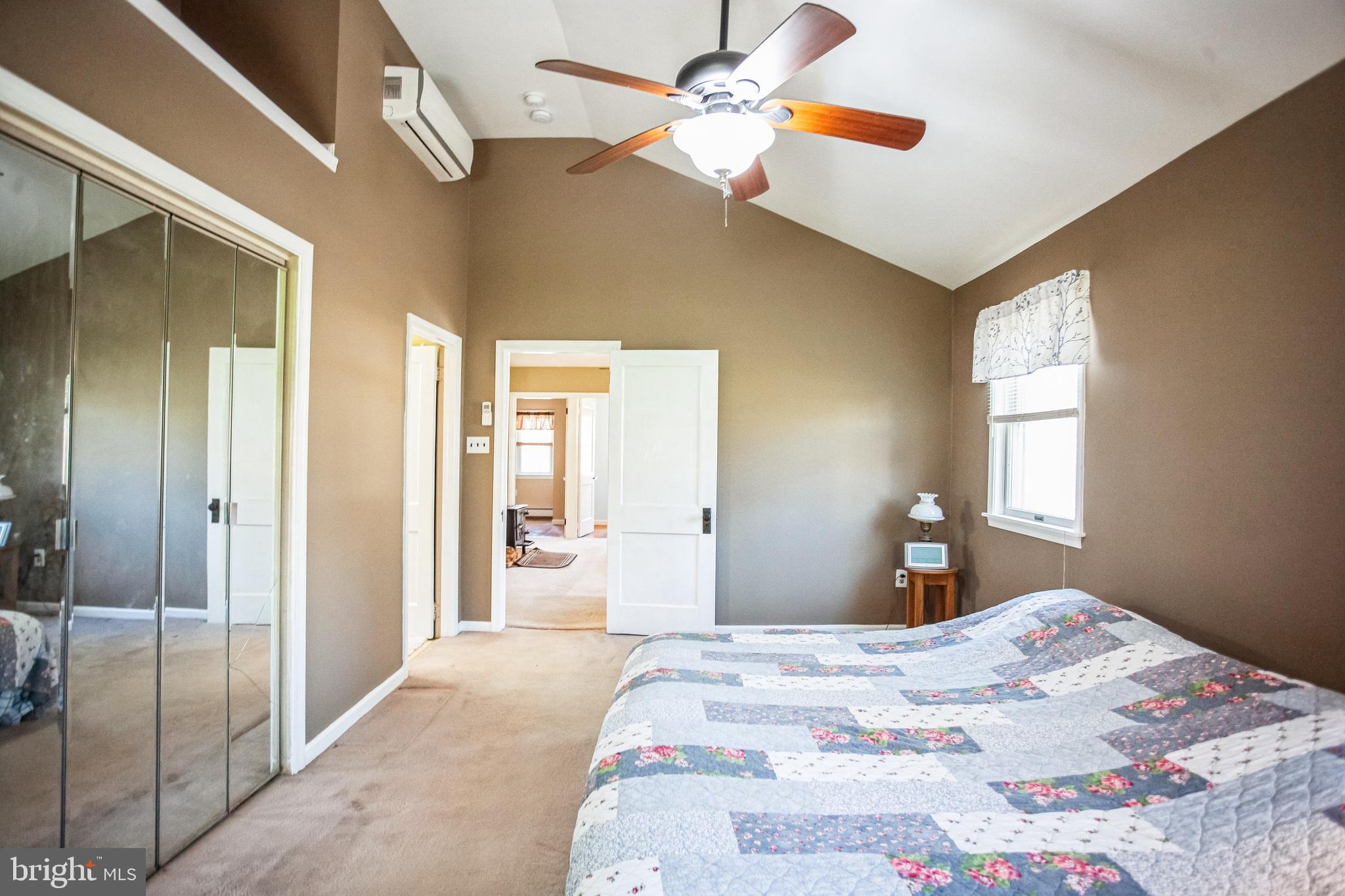 2775 Valley Road Jamison, PA 18929 - Photo 26 of 40 a bedroom with a bed and a chandelier