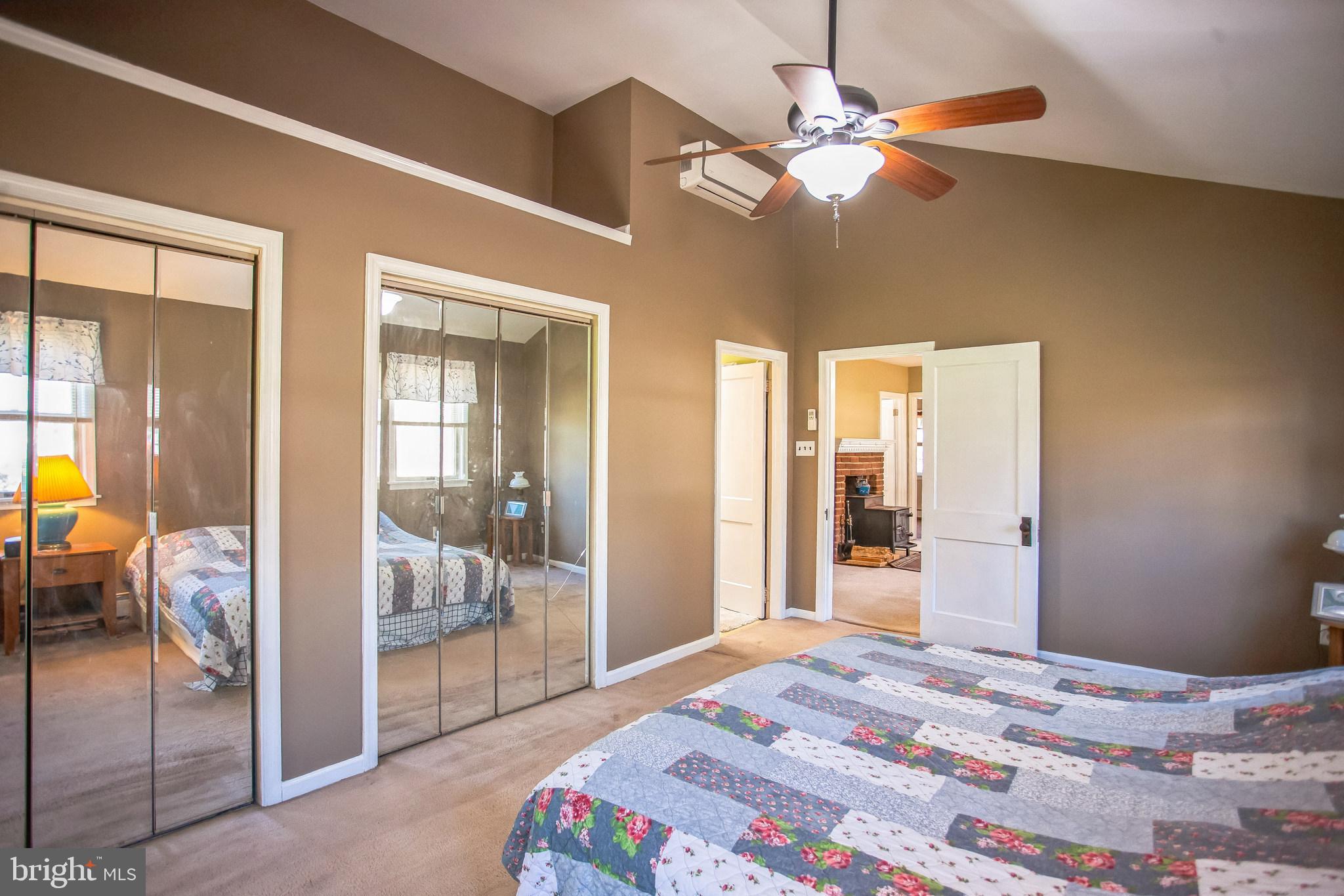 2775 Valley Road Jamison, PA 18929 - Photo 27 of 40 a bedroom with a bed and a chandelier