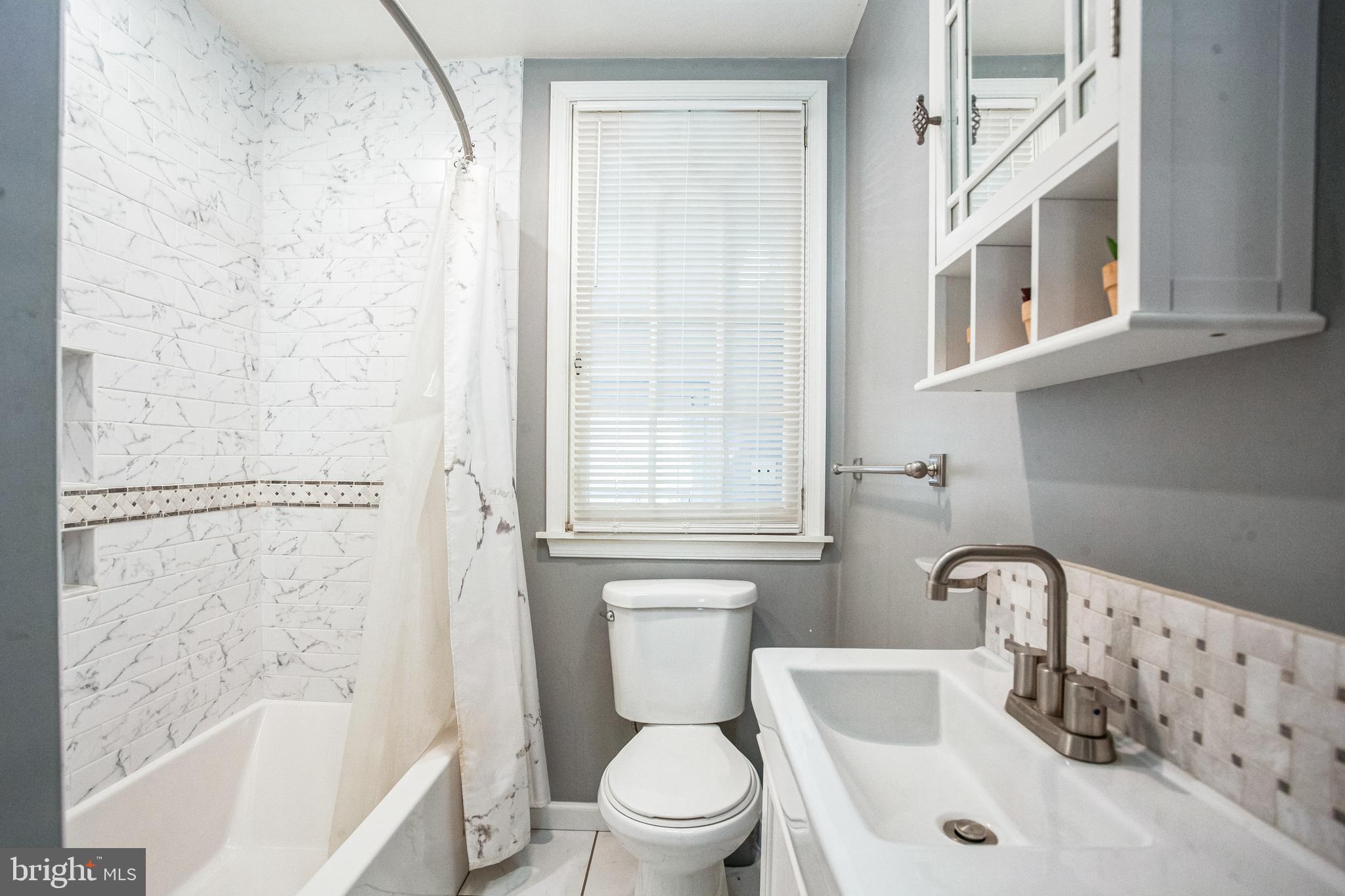 2775 Valley Road Jamison, PA 18929 - Photo 33 of 40 a white toilet sitting next to a bathroom sink