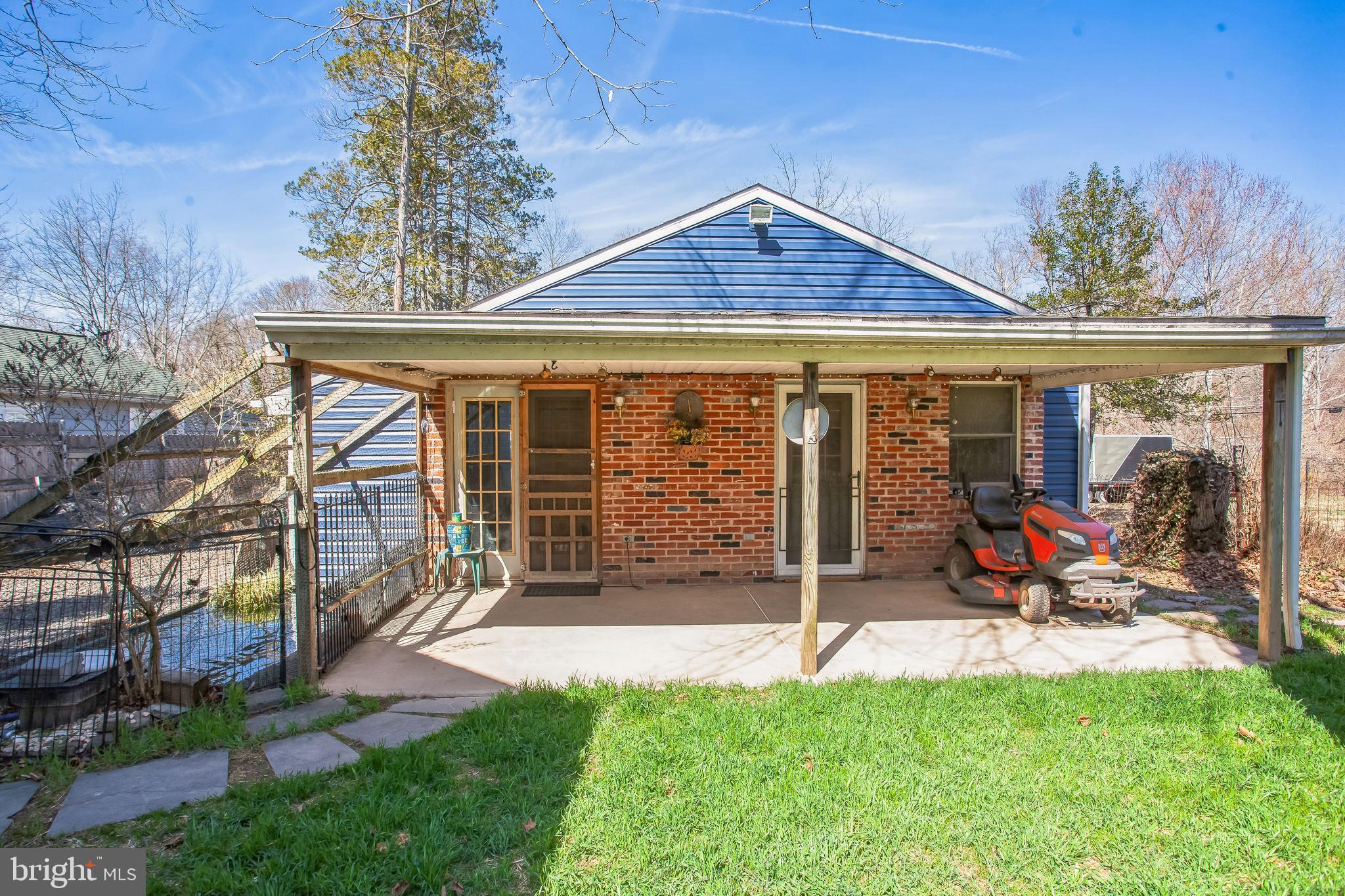 2775 Valley Road Jamison, PA 18929 - Photo 35 of 40 a view of a house with a large window and a yard