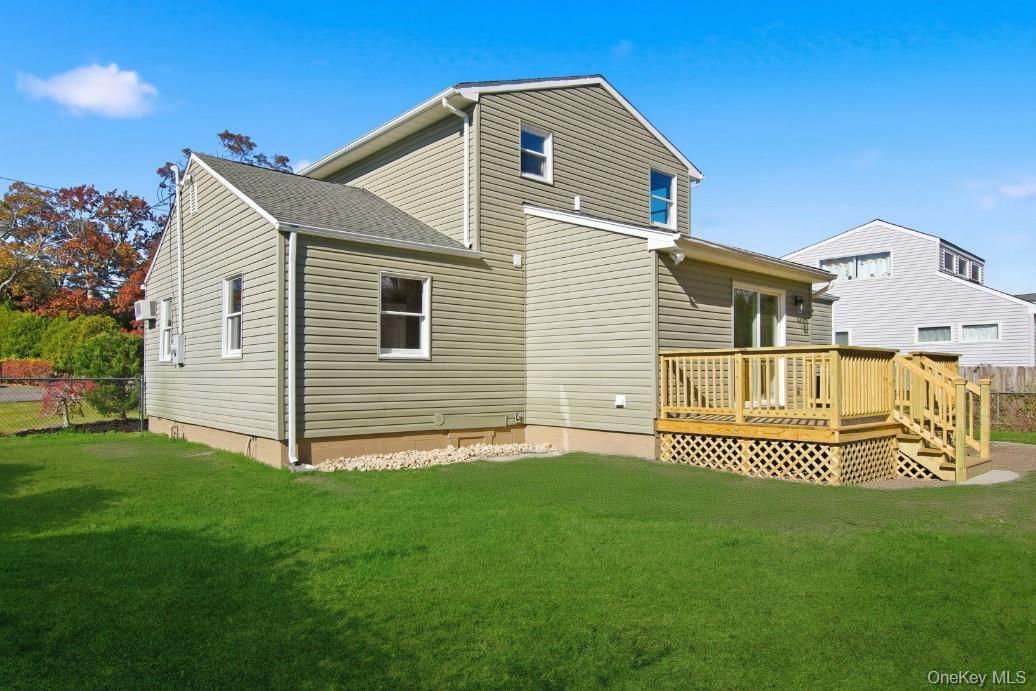 225 Lyman Road East Patchogue, NY 11772 - Photo 18 of 18 Back of house with a deck