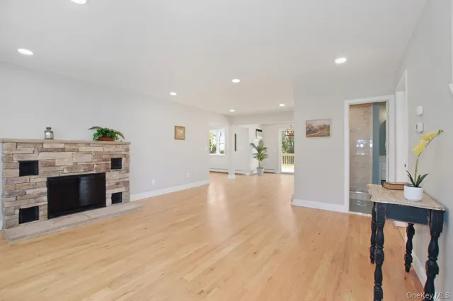 a view of kitchen with furniture and fireplace